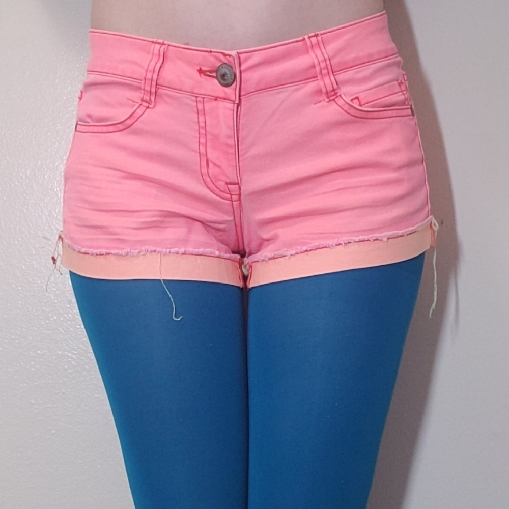 Pink lightly distressed shorts